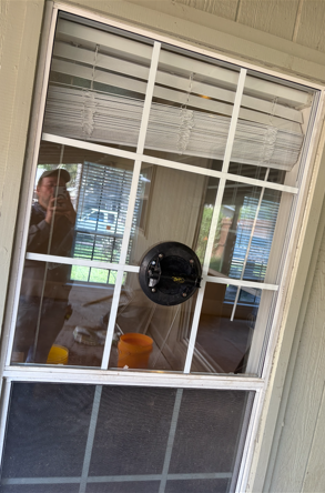 Double pane insulated glass repair on a window in a Dallas-area home