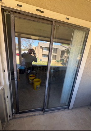 Patio door glass repair and replacement in a Garland residence